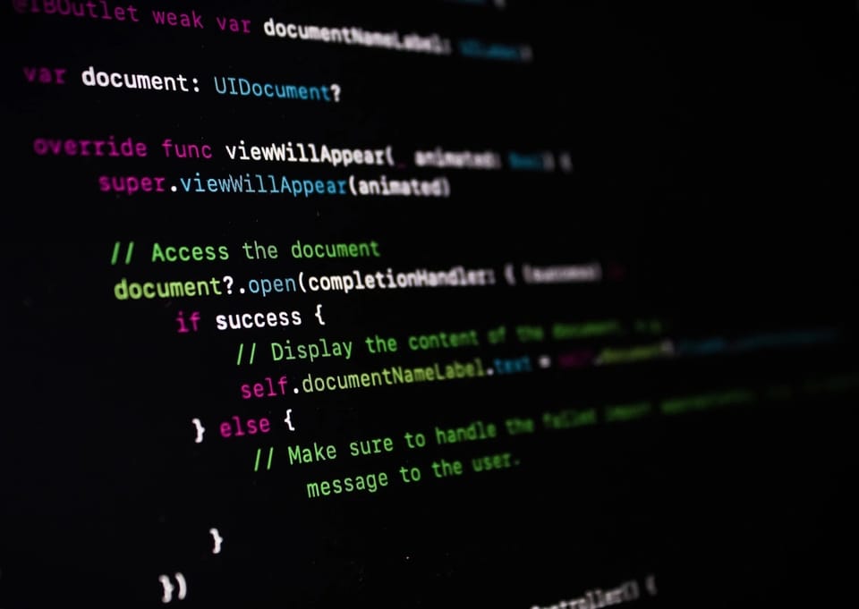Source code on a dark screen